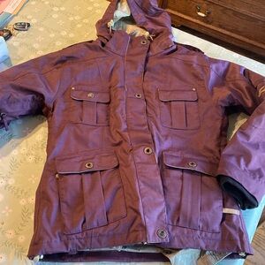 Used purple ski jacket